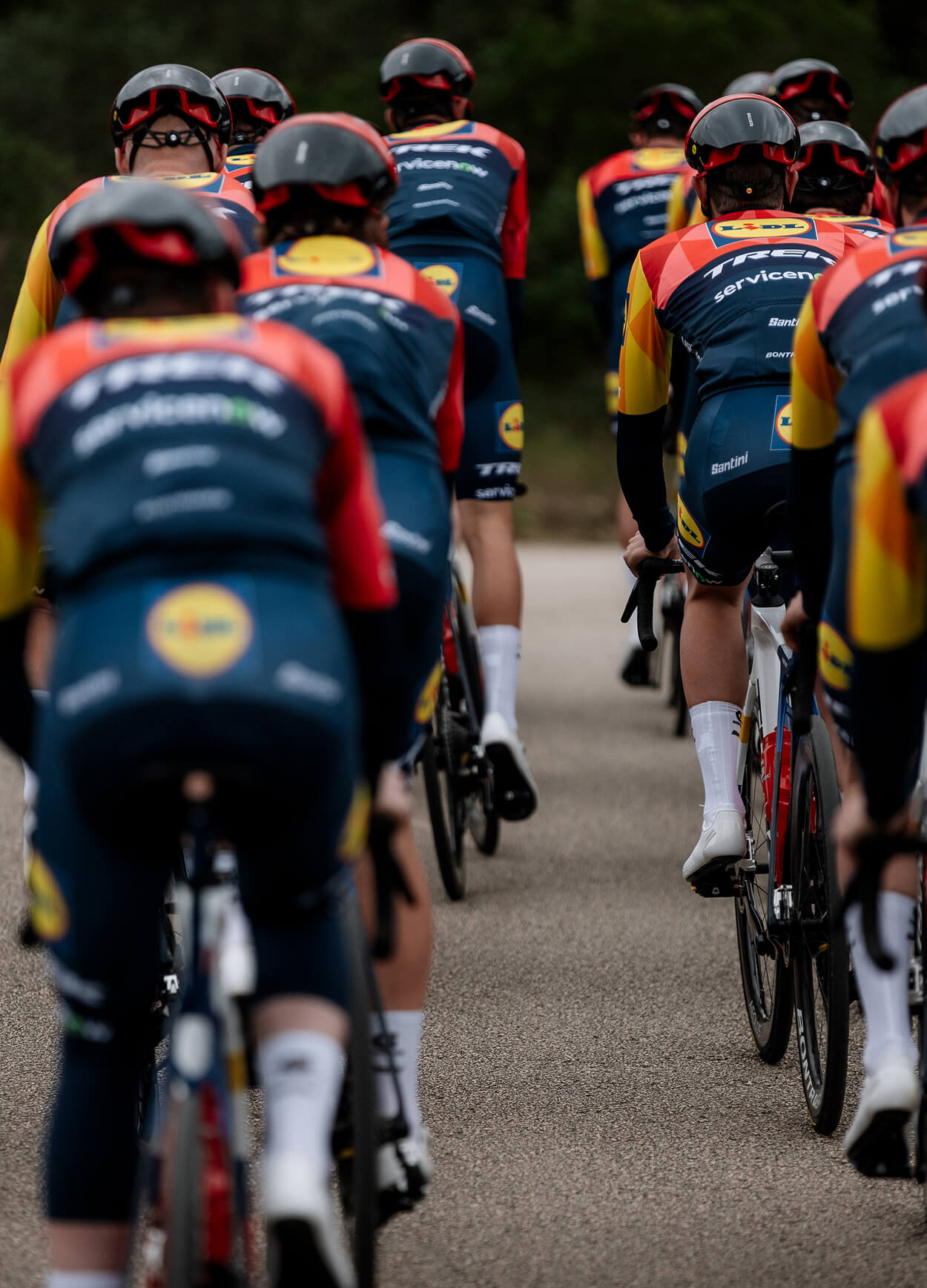 Junior cyclists racing in a group